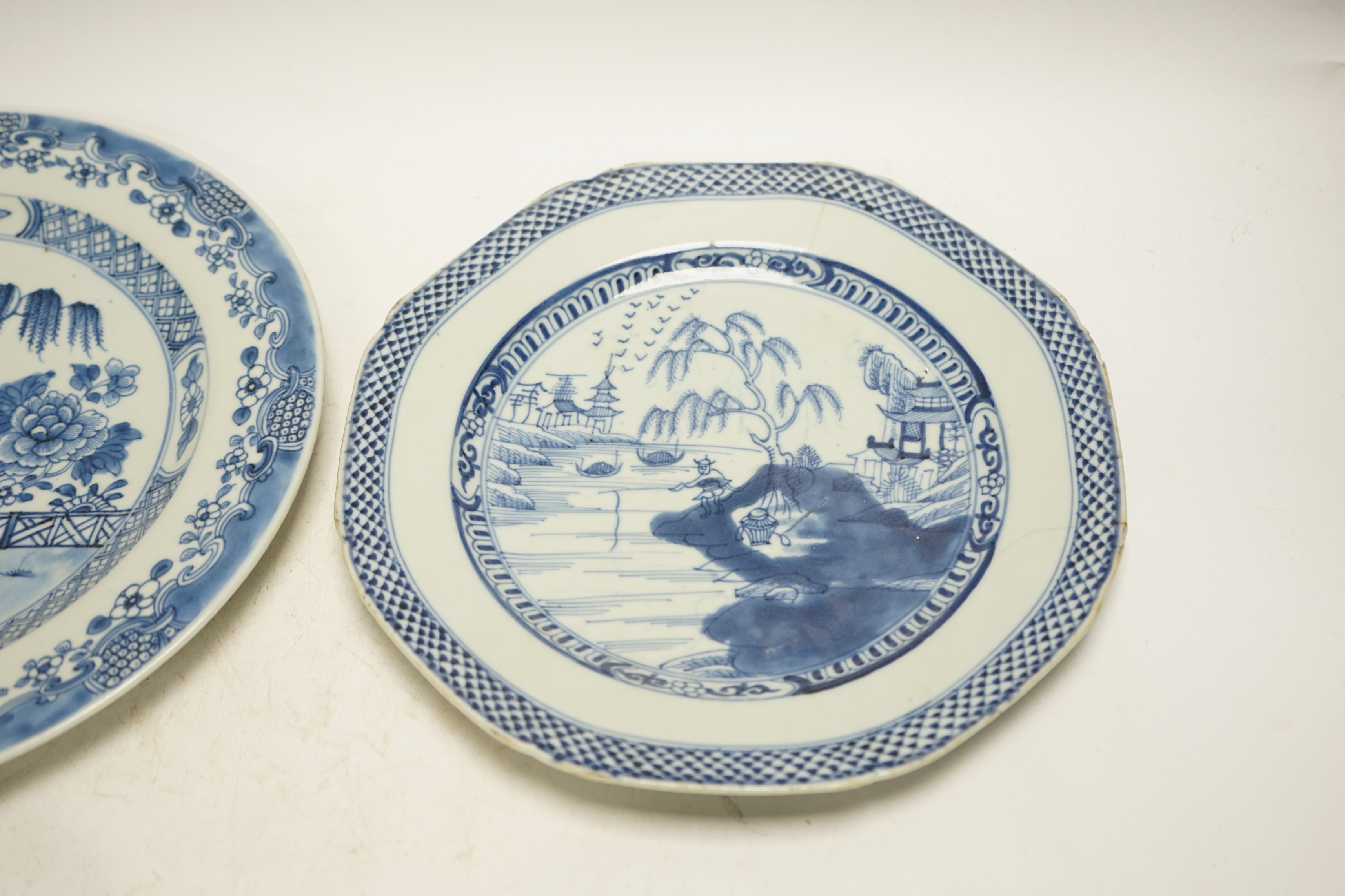 Four various Chinese export blue and white dishes, 18th/19th century, largest 26cm, largest 26cm diameter. Condition - one plate cracked, chips to another